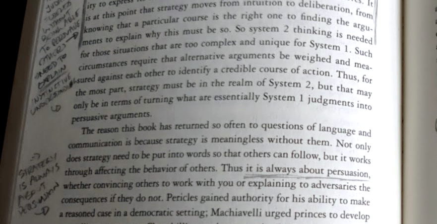 A photo of marginal notes made in the book Strategy: A History, by Laurence Freedman